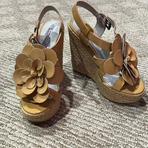 Vera Wang Lavender, tan with floral embellishments. Wedge with braided jute.